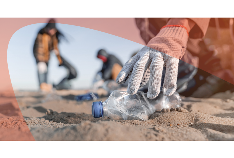 picking up beach plastic