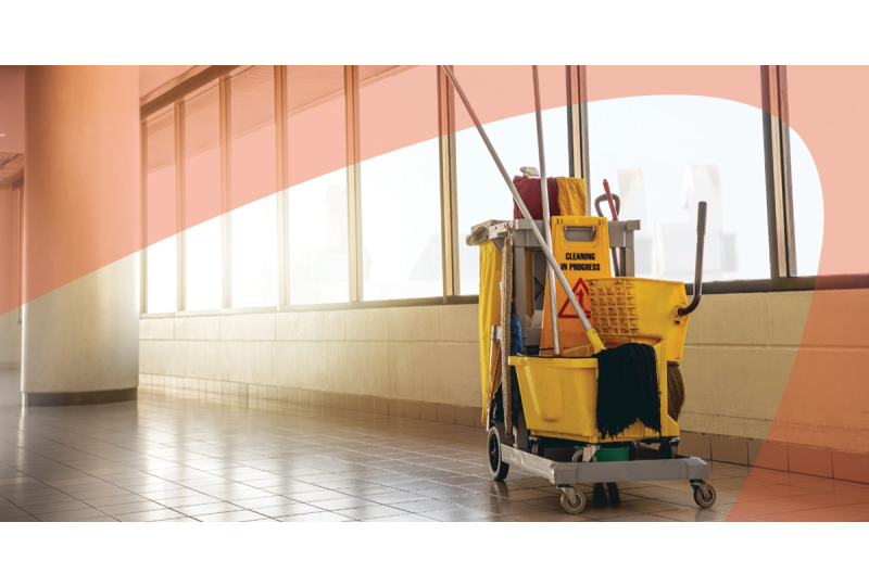 Janitor Cart In Bright Hallway
