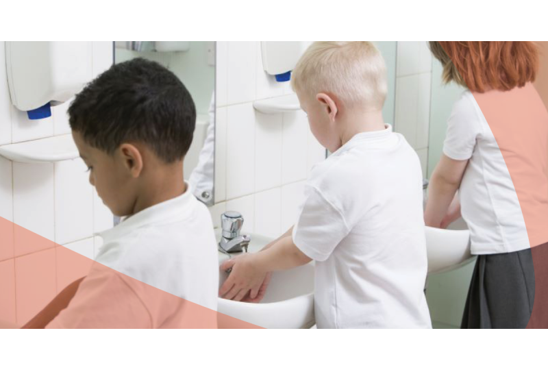Children washing hands at school