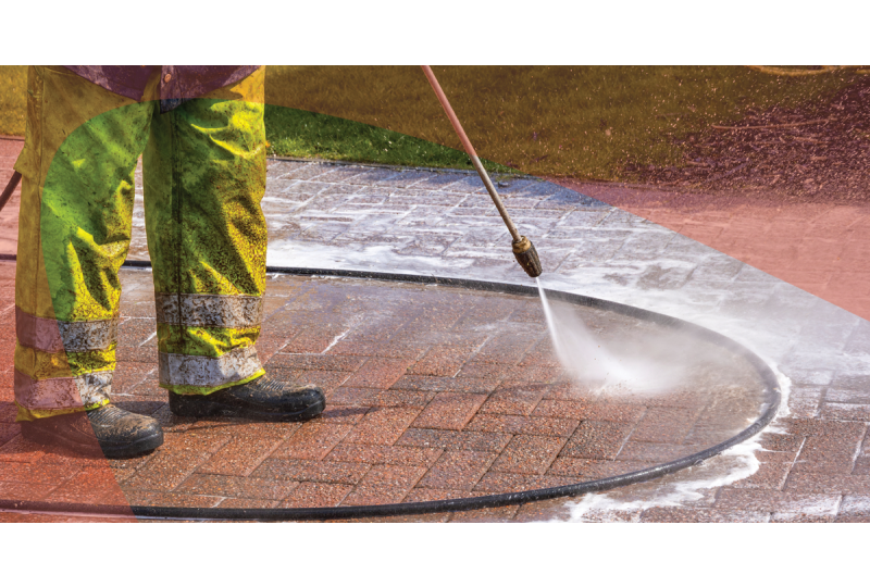 Pressure washing pavement with detergent