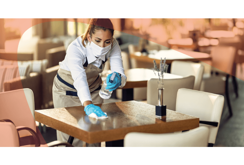 Woman cleaning restaurant