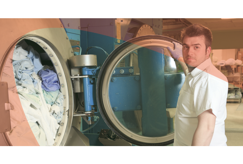 loading commercial laundry machine