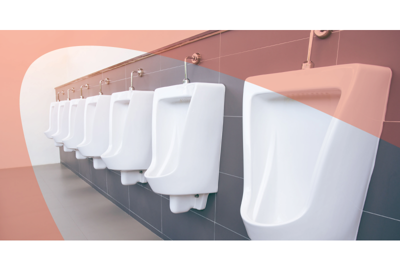Public Washroom With Row Of Urinals