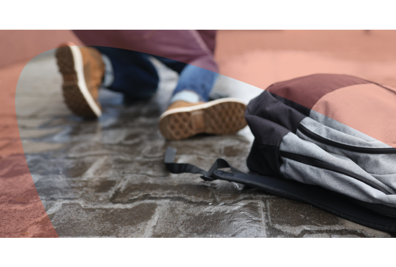 Man slip and falling on icy paving stones